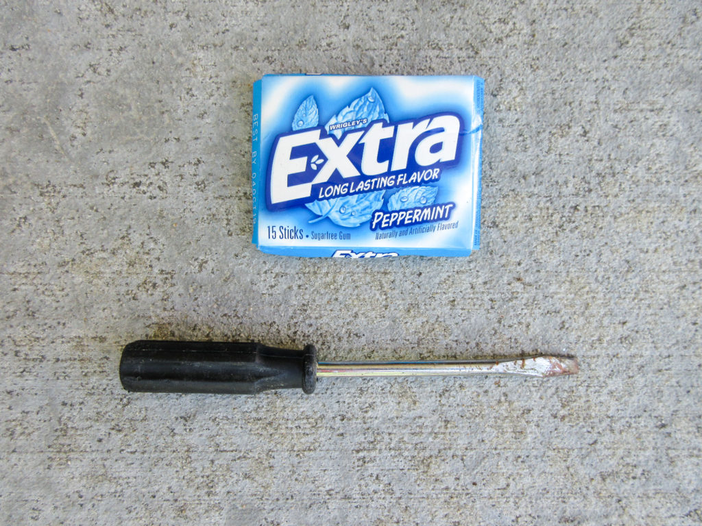 Pack of Extra gum and slightly bent screwdriver