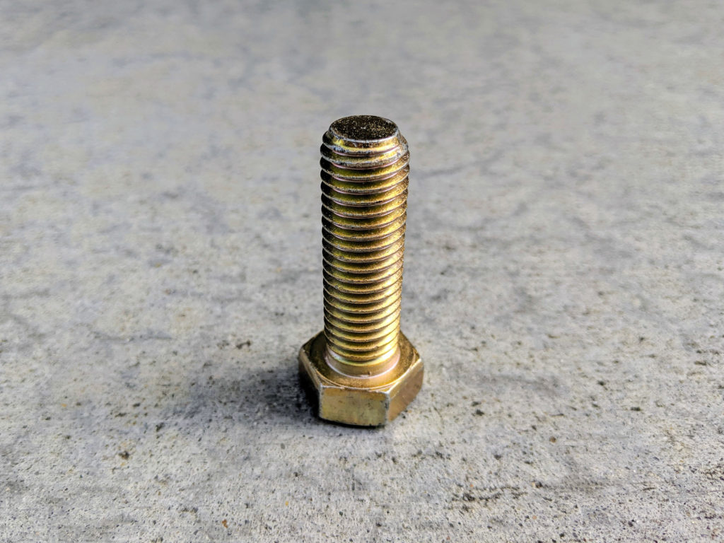 Large brass bolt