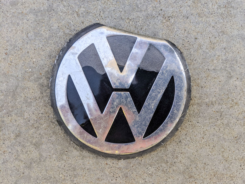 Partially bent VW emblem