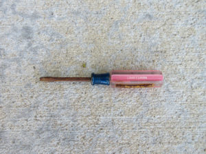 Very rusted Craftsman flat head screwdriver