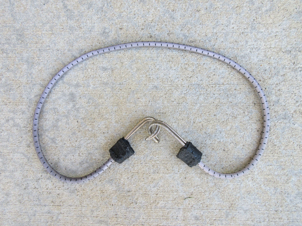 Silver bungee cord with metal end hooks