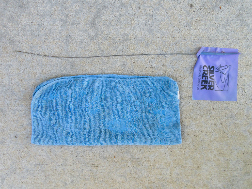 Purple landscape flag and blue microfiber rag