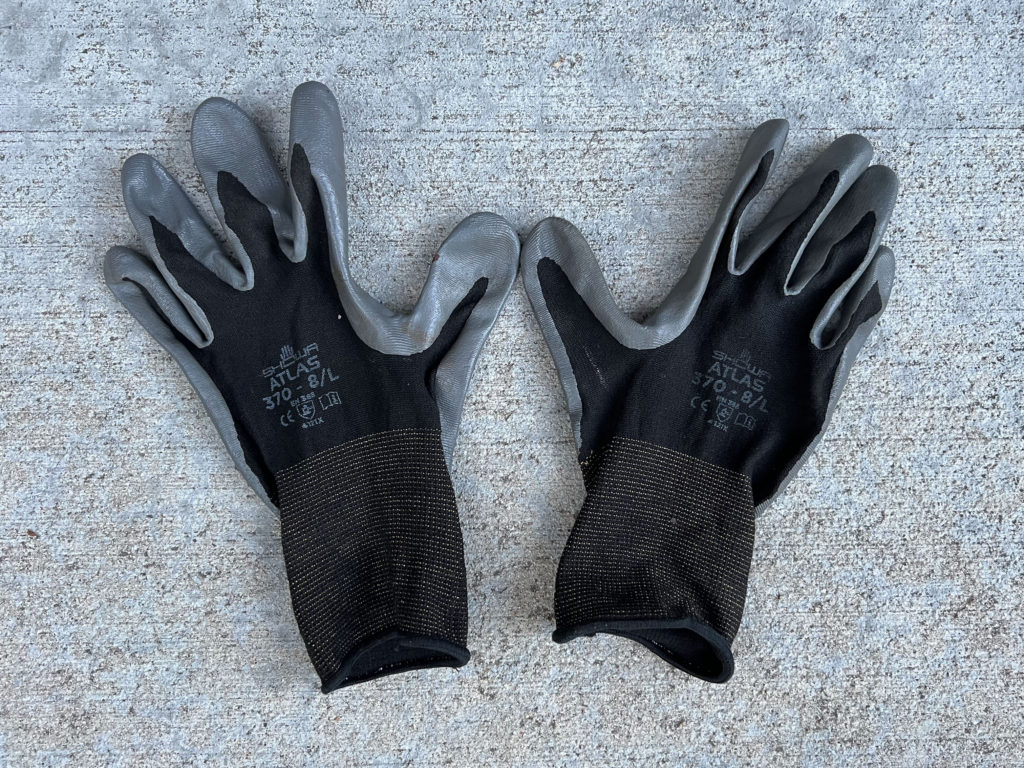 Pair of black and gray work gloves