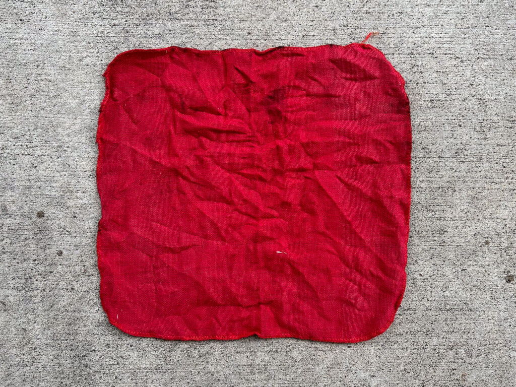 Red work rag with some light stains