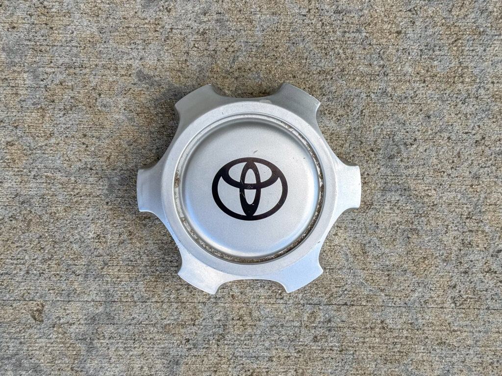 Silver Toyota wheel center cap